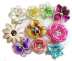 Assorted plastic flower trims in various designs and colours.