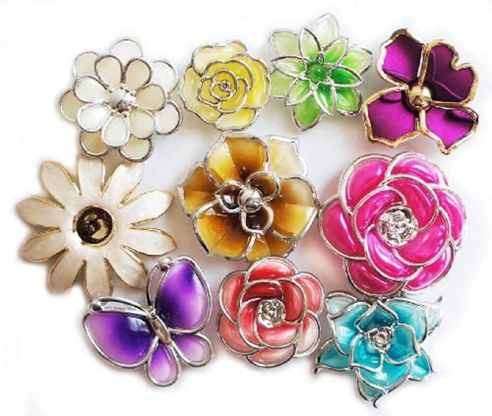 Assorted plastic flower trims in various designs and colours.