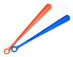 Two plastic shoehorns, each 46 cm long, in a flat position.