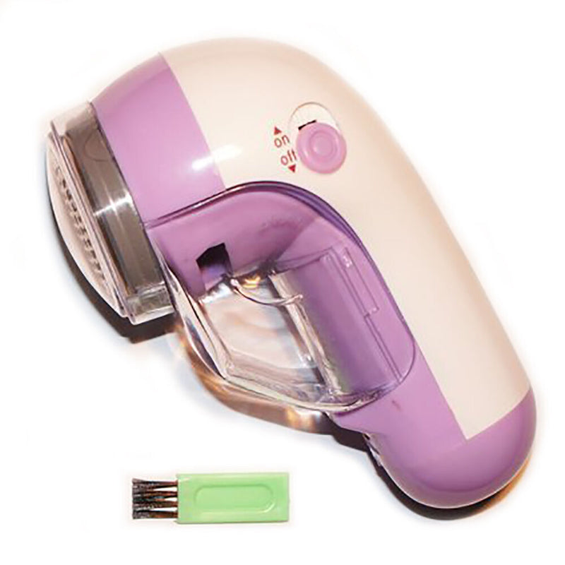 Energy storing lint remover with a removable plug