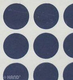 Various sheets of self-adhesive round labels displayed