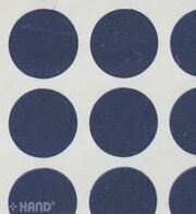 Various sheets of self-adhesive round labels displayed