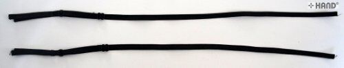 Adjustable black bra shoulder strap showing metal adjuster detail.