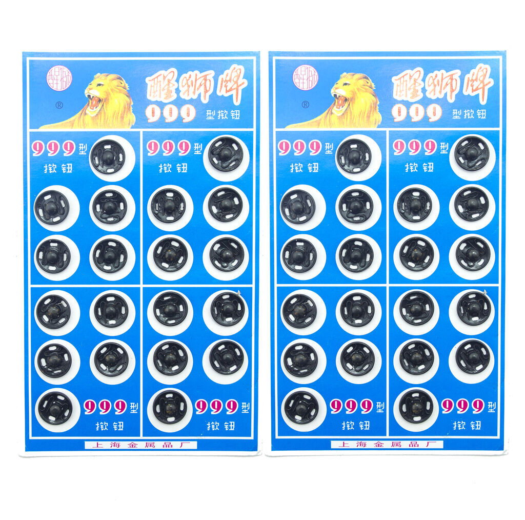 Black metal clip buttons, 11mm wide, suitable for various garments.