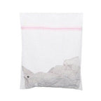 Laundry mesh bag filled with socks for washing