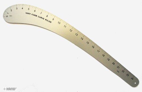 Vary form curve ruler placed on a cutting mat with fabric