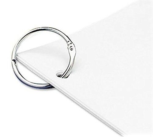 Binding rings displayed with papers and swatches for organisation.