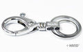 Two solid all metal double key rings displayed together.