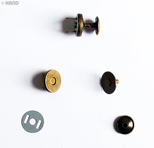 Usage example of vintage gold magnetic press studs on fabric.
