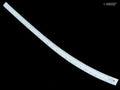 White metric curve ruler measuring 56cm on a flat surface.