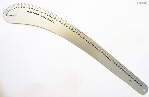 Close-up of the curve ruler showing measurement markings