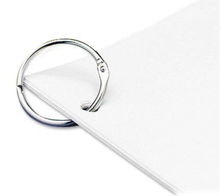 Close-up of a large heavy duty binding ring showing the hinge mechanism.