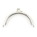 Round silver purse frame PF25 with decorative perforations.