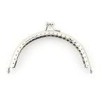 Round silver purse frame PF25 with decorative perforations.