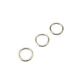 Close-up of metal O lingerie rings in silver colour.