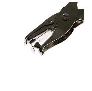 Single hole punch in use on a sheet of paper