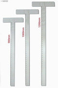 Large T Square acrylic ruler on a crafting table.