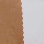 Scissors cutting through colourful paper for crafts.