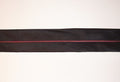 Black tailor waist band roll, 10 metres long.