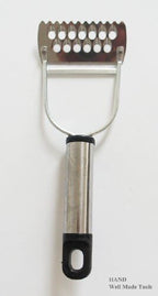 Slicing fresh vegetables with the multi-function peeler.