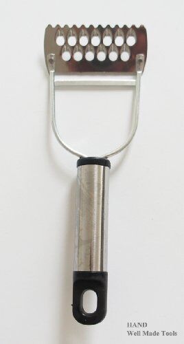 Slicing fresh vegetables with the multi-function peeler.