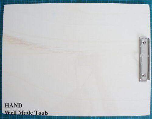 Close-up of the natural wood texture of the clipboard