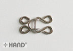 Hook and eye fasteners used in a sewing project