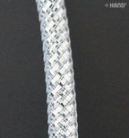 Roll of lightweight hollow tube crin elastic in silver.