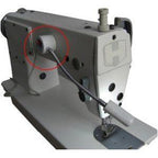 Light positioned over a sewing project for clear visibility