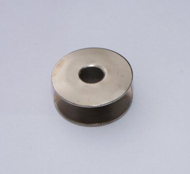 Close-up of the lockstitch bobbin showing its design
