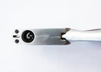 Pattern hole punch demonstrating its ergonomic handle