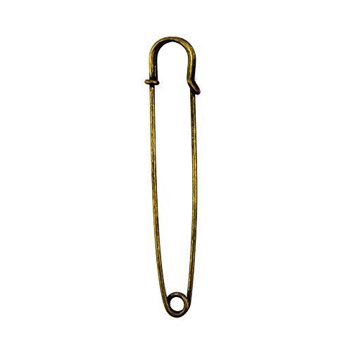 Close-up of a gold kilt pin showing its 102 mm length.