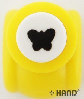 Close-up of the butterfly punch mechanism in action.