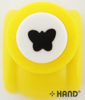 Butterfly shape craft paper punch on a white background.