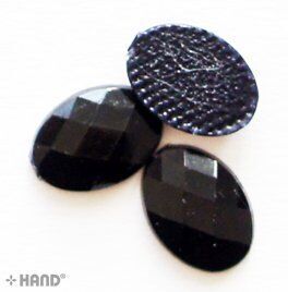 Display of D10 black oval hotfix diamante gems in a pack.