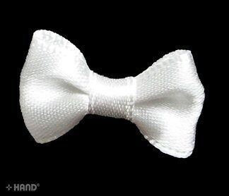 Variety of satin white ribbon bows displayed together