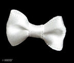 Variety of satin white ribbon bows displayed together