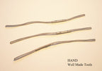 Close-up of silver grey stretchy hangtag string, 13cm long.