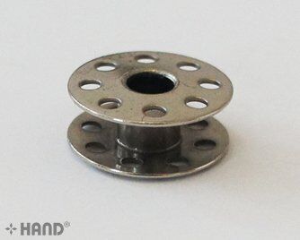 Close-up of a metal bobbin showcasing its smooth finish.