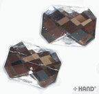 Various angles of crystal white rectangular hotfix gems