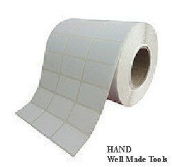 Labels on a table, demonstrating their rectangular shape and size
