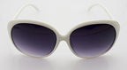Sunglasses on a flat surface highlighting the lens size.