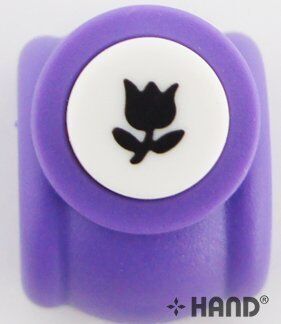 Tulip shape craft paper punch on a wooden table