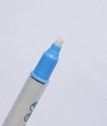 Magic Erasable Ink Pen being used to write on paper