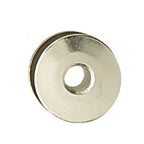 Lockstitch bobbin in packaging with sewing tools