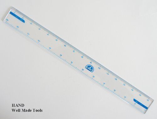 Cross stitch ruler showing clear measurement markings.