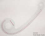 Close-up of the curved edge of the pattern ruler