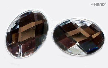 Iron on application of crystal white oval rhinestones