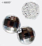 Display of crystal white round hotfix rhinestones in packaging.