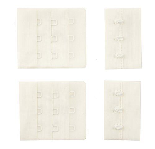 Close-up of white bra hook and eye fasteners with 3 hooks